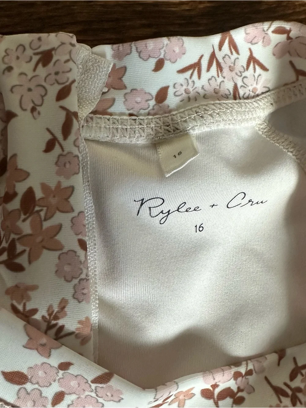 Rylee + Cru Long Sleeve Floral One-Piece in Light Pink and Cream
